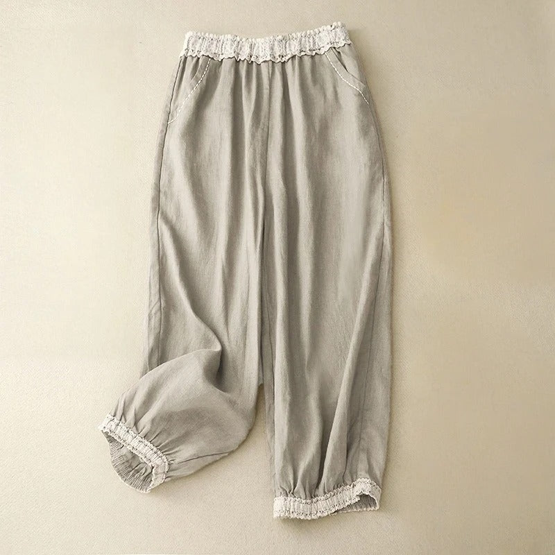 Women's linen trousers natural tone relaxed fit with delicate lace cuffs for polished casual style