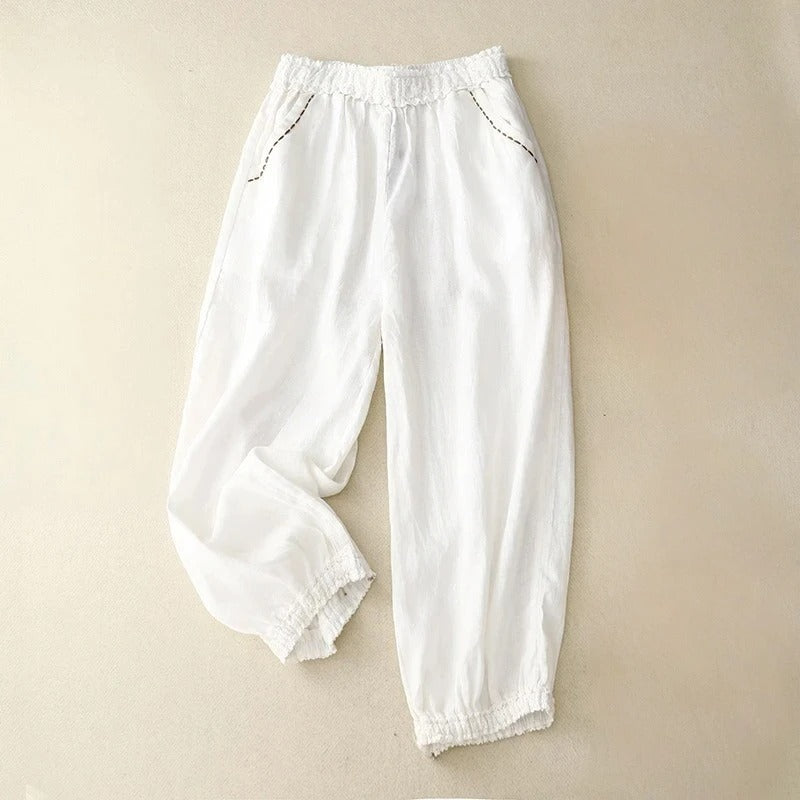 Women's beige linen trousers relaxed fit with delicate lace cuffs, lightweight breathable casual style