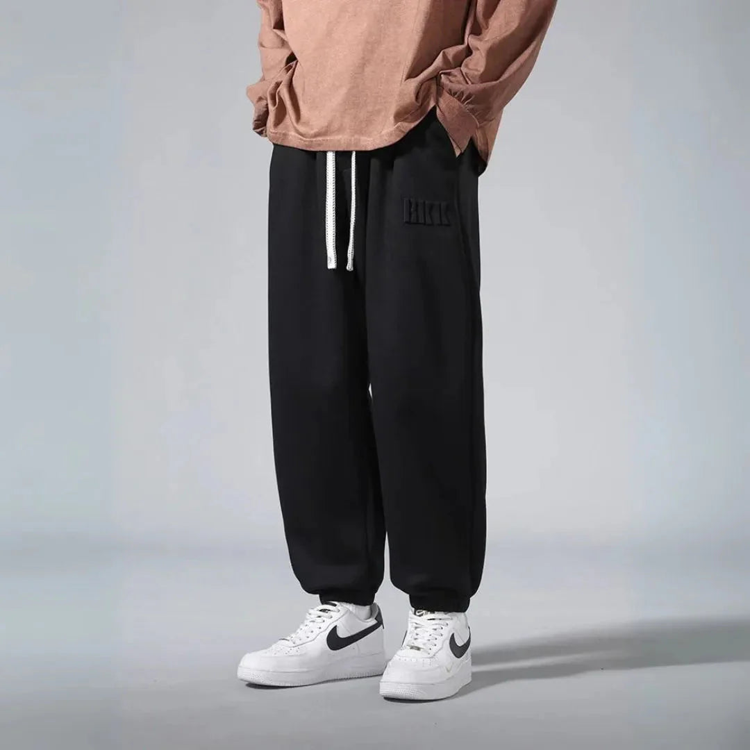 Men's relaxed fit cotton streetwear joggers with soft brushed fleece interior for all-day comfort