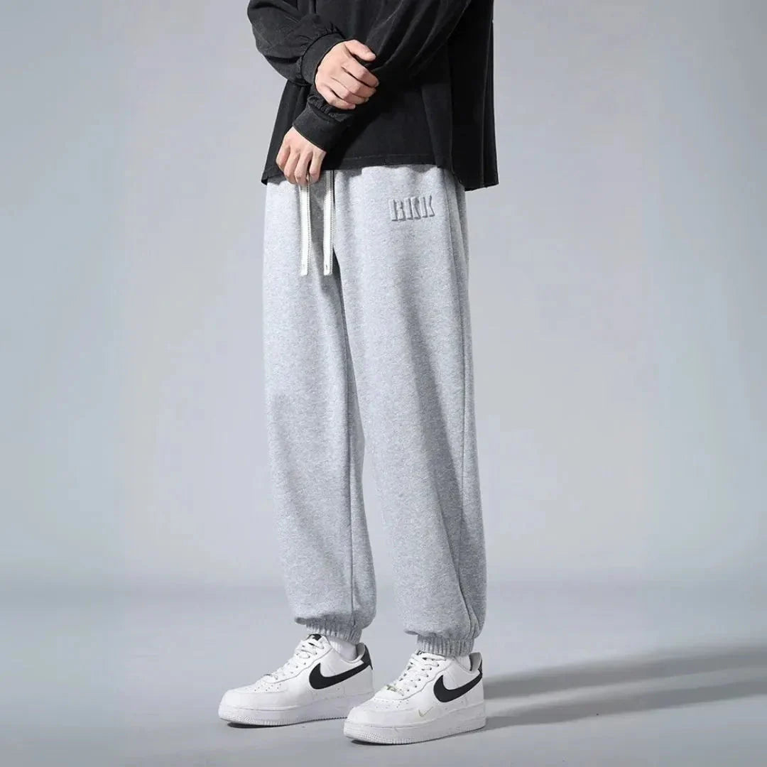 Men's relaxed fit cotton streetwear joggers with soft brushed fleece interior for all-day comfort