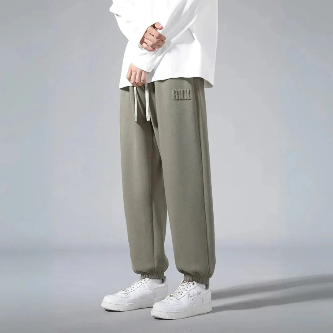 Men's relaxed fit cotton joggers with brushed fleece interior, streetwear style for all-day comfort
