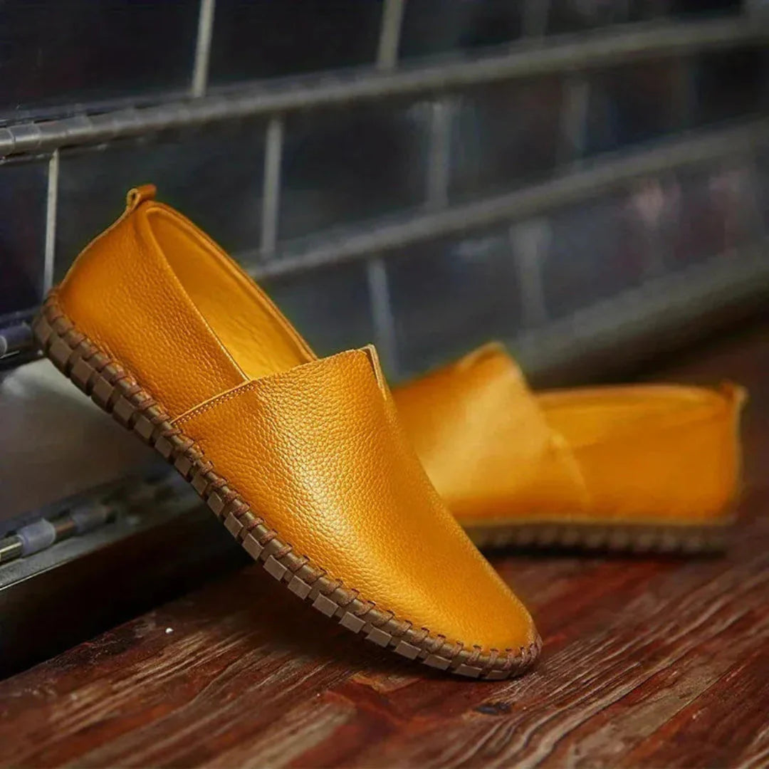 Men's brown textured faux leather casual slip-on loafer with cushioned insole and flexible rubber sole