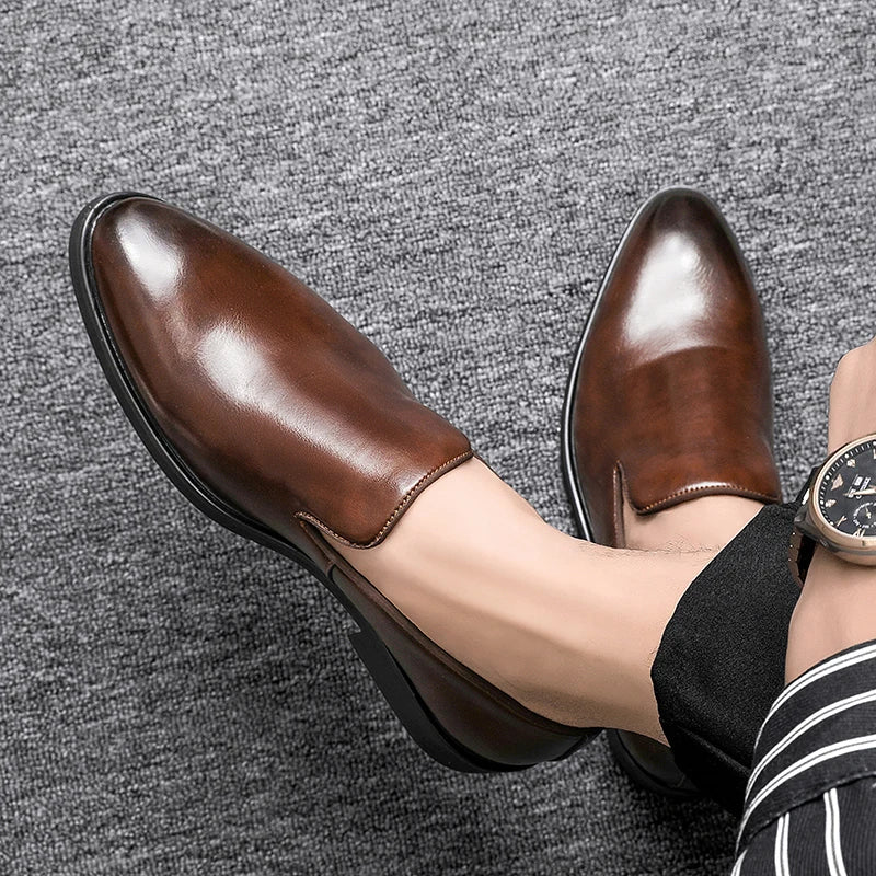 Black genuine leather slip-on loafers sleek low-cut silhouette with burnished finish for professionals