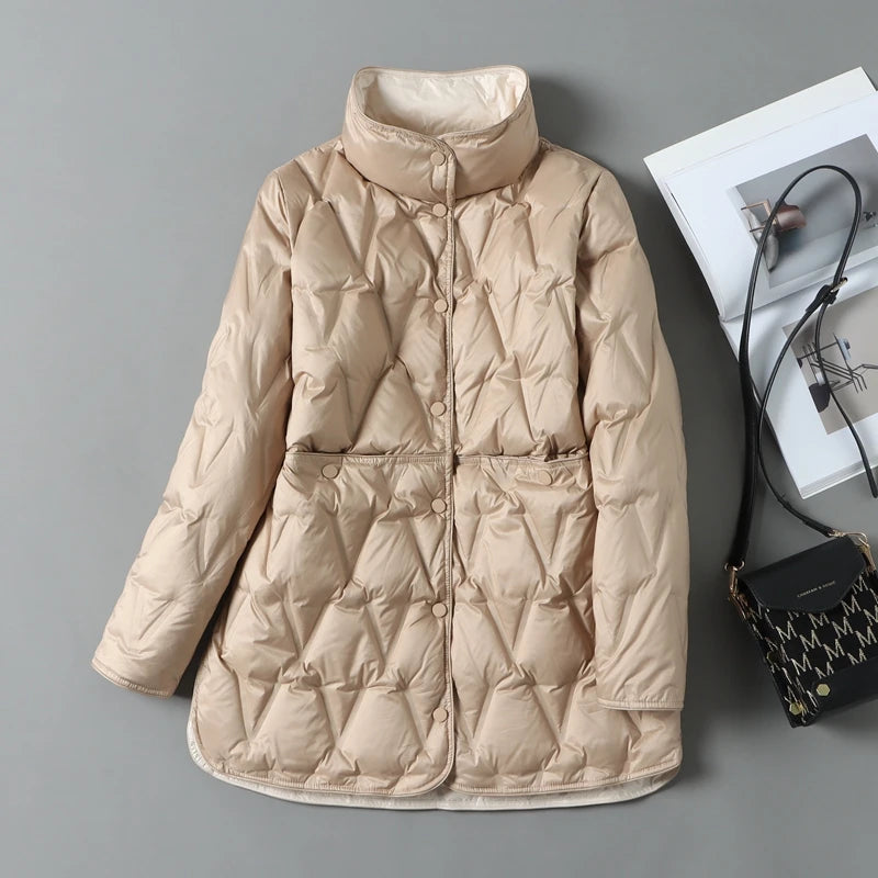Women's mid-length quilted down jacket in diamond quilt pattern with snap closures featherlight warmth