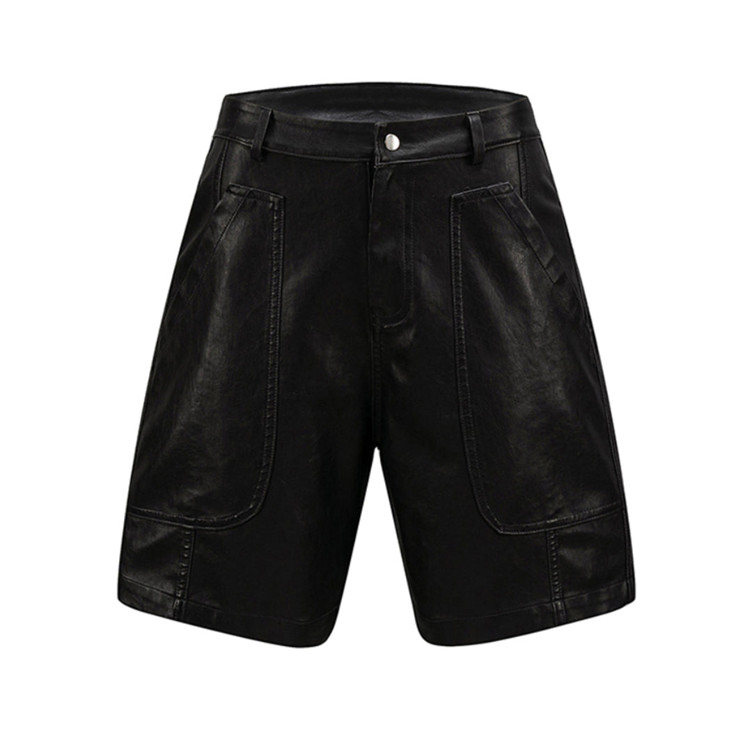 Black matte vegan leather knee-length shorts with paneled texture, loose mid-rise fit