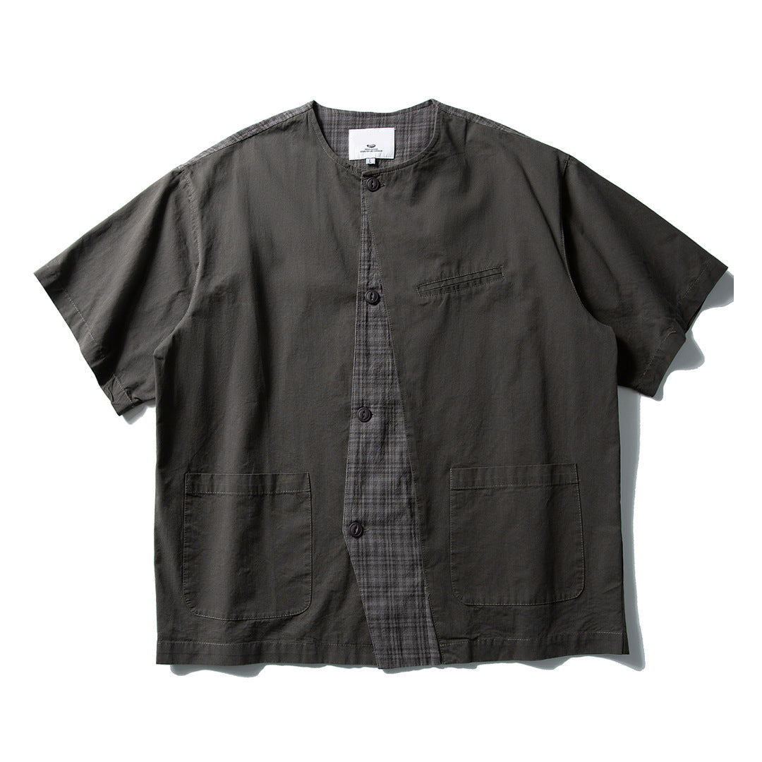 Unisex collarless plaid shirt in soft cotton with asymmetrical linework and loose relaxed fit