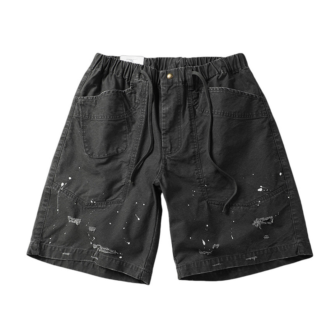 Men's splash ink cargo shorts with ripped details, elastic waist, wide leg cut, bold streetwear style