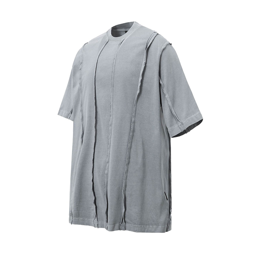 Oversized striped cotton tee with fringe claw detail, crew neck, loose streetwear silhouette