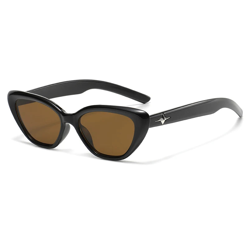 Glossy black acetate cat eye sunglasses with bold star temple details for a cosmic chic look