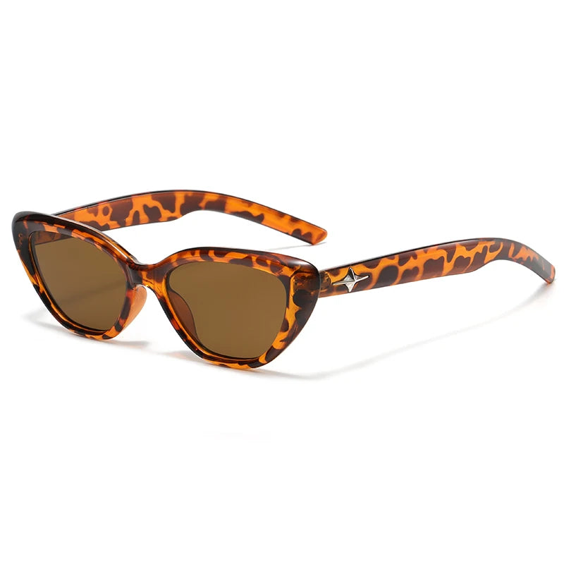 Glossy black cat eye sunglasses with acetate frame featuring star-shaped temple details