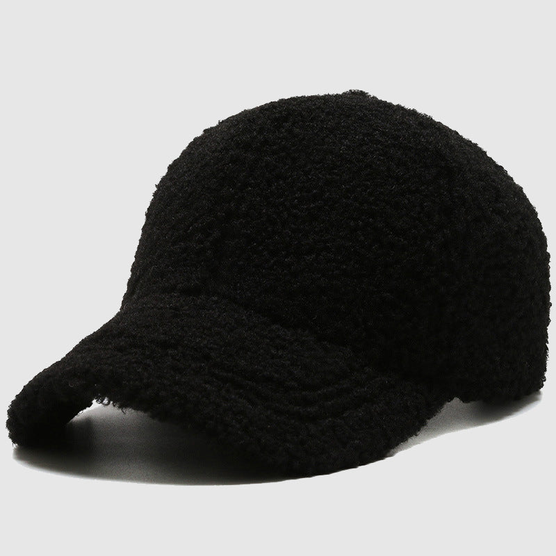 Ivory vegan fur soft cap with cloudlike plush texture, cozy winter beanie for cold weather