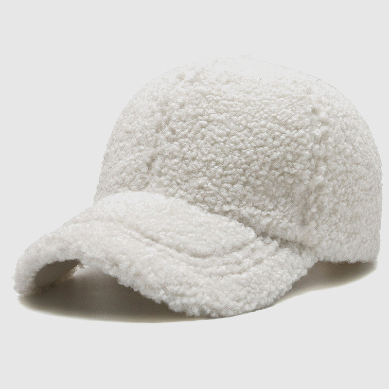 Beige vegan fur soft cap with cloudlike plush texture, cozy winter accessory for cold weather