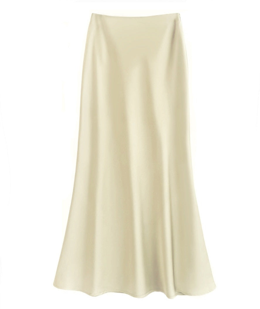 Women's ivory silk maxi skirt with tailored waist, flattering draped silhouette for elegant versatility