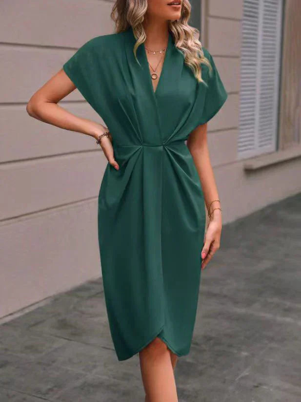 Black midi wrap dress with classic wrap silhouette, easy-care fabric for office to evening wear
