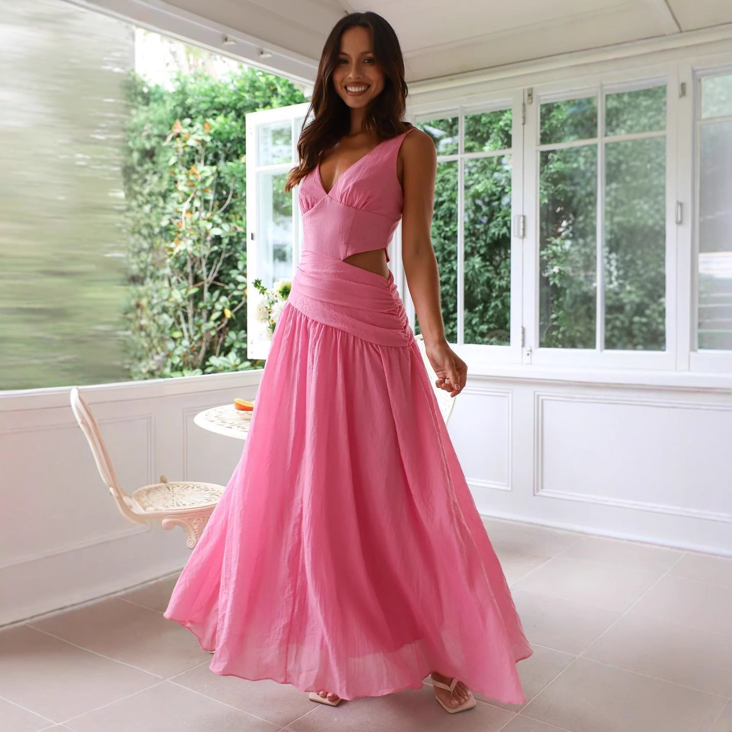 Women's sleeveless V-neck maxi dress A-line silhouette with chic waist cutout for summer occasions