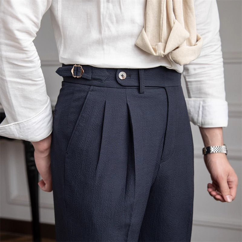Men's dark brown slim fit tailored pleated dress trousers with modern office-ready cut
