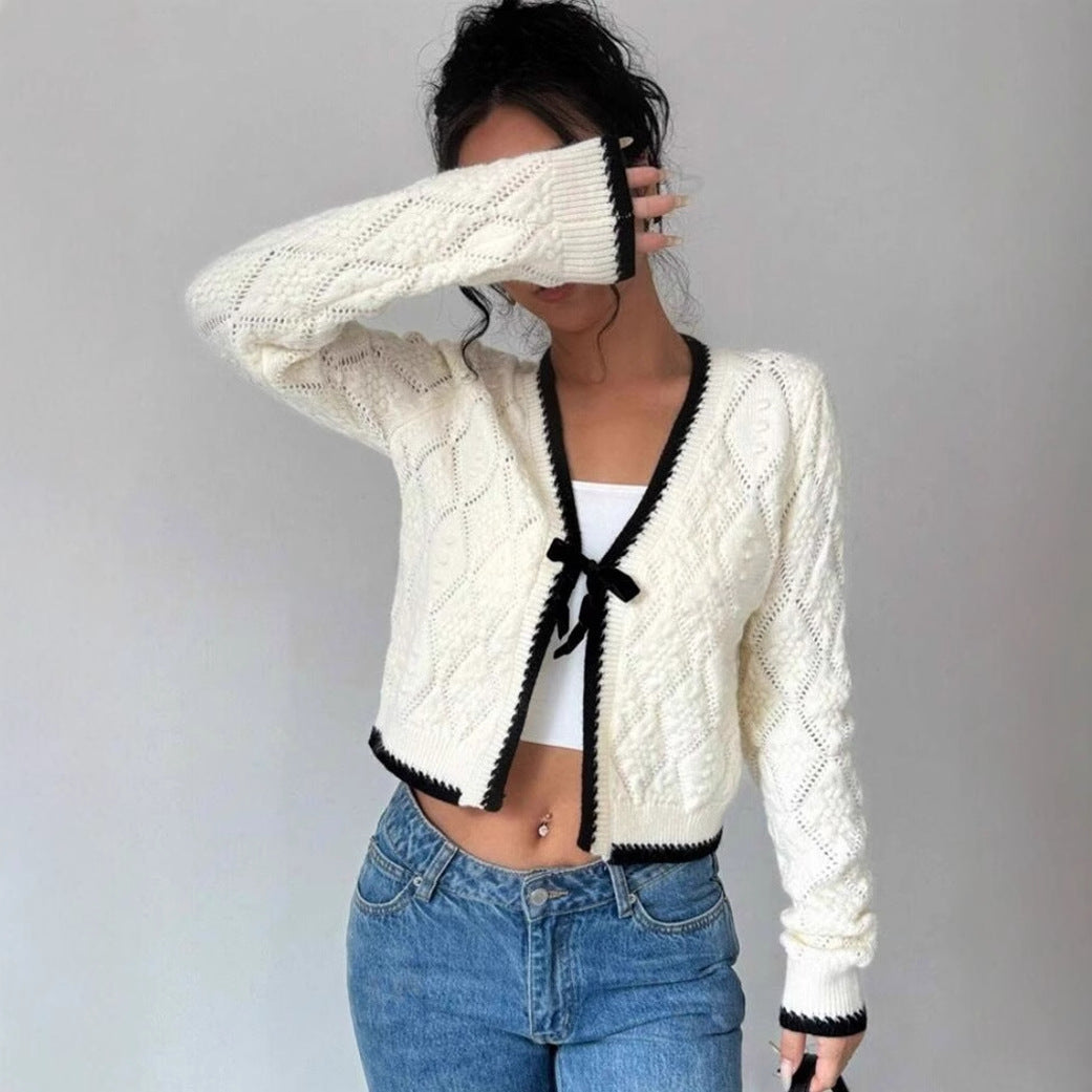 Women's cropped knit cardigan Nordic flair style with bow closure, casual everyday layering piece