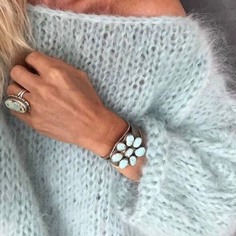Women's lightweight knit sweater elegant clean silhouette breathable all-season versatile layer