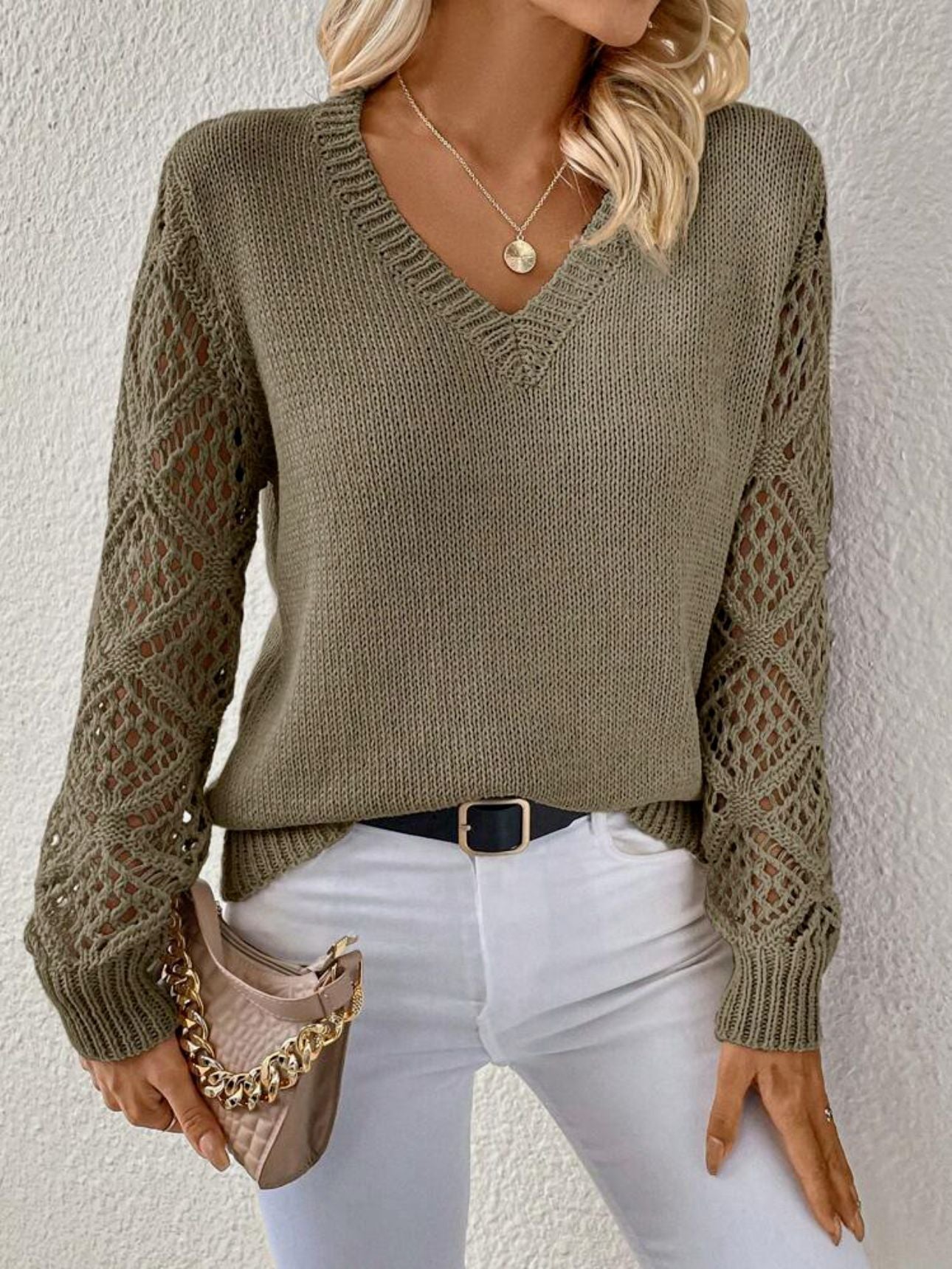 Women's beige V-neck knit sweater with open-work crochet sleeves, relaxed fit, effortless layering style