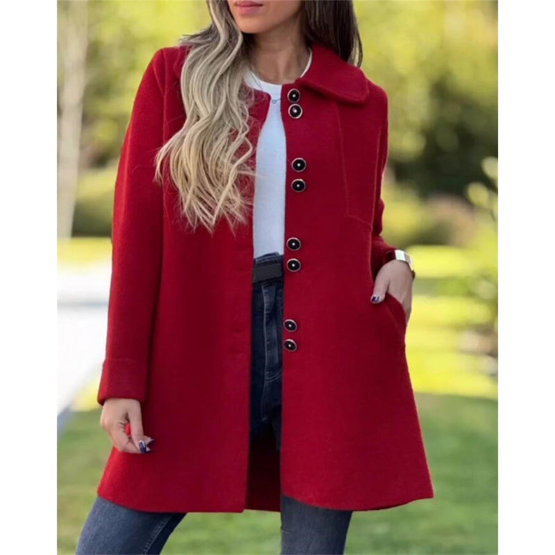 Women's mid-length structured coat with wide collar and button closure for timeless winter elegance