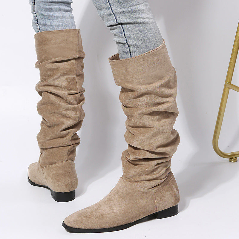 Women's slouchy knee-high boots block heel relaxed silhouette everyday casual chic style