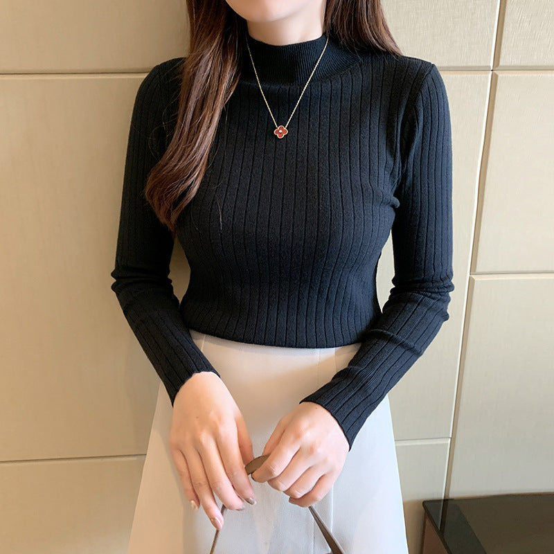 Women's ribbed turtleneck top in cozy knit, fitted silhouette with soft viscose drape for fall winter