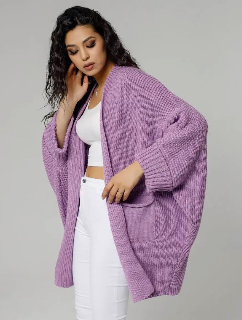 Women's oversized open-front knitted cardigan in cozy wool blend, relaxed layering essential