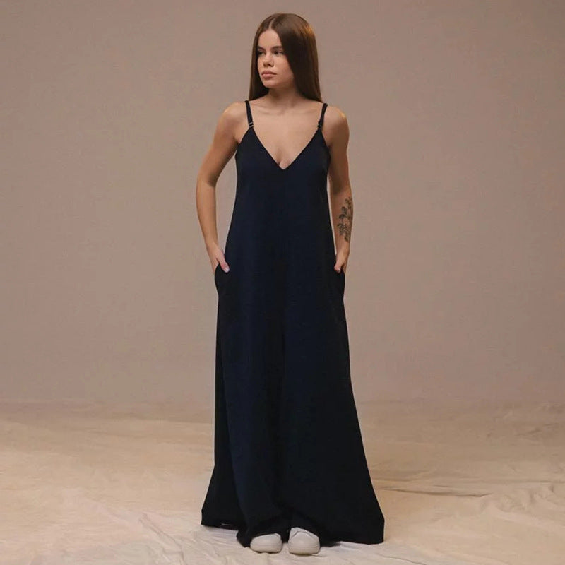 Women's linen blend loose fit sleeveless jumpsuit in neutral tone with V-neck and tie belt