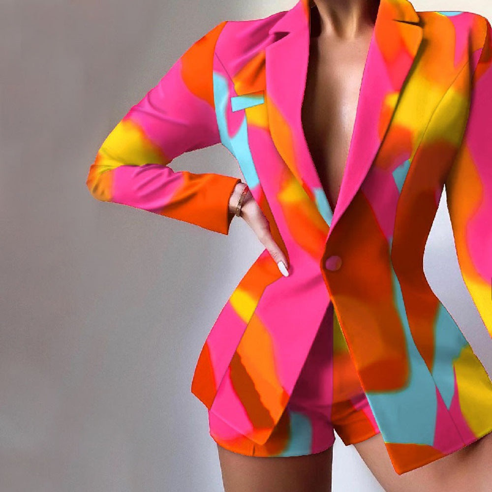 Women's leopard print tailored blazer with peaked lapels and long sleeves, bold statement piece