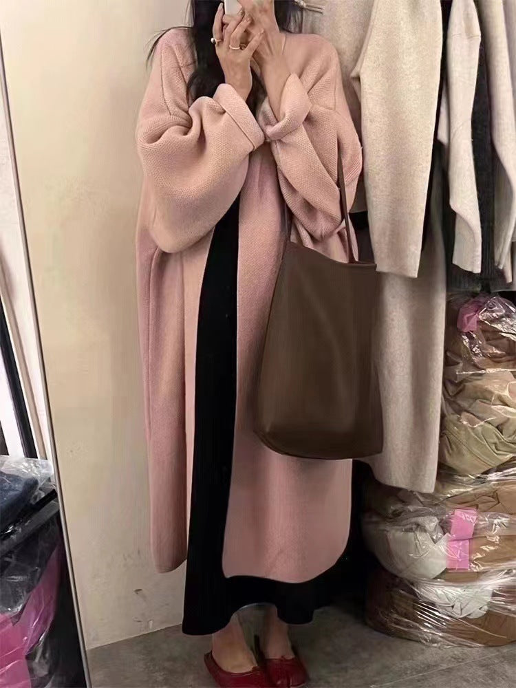 Women's oversized wool knit cardigan coat with draped open front, full-length silhouette for layering