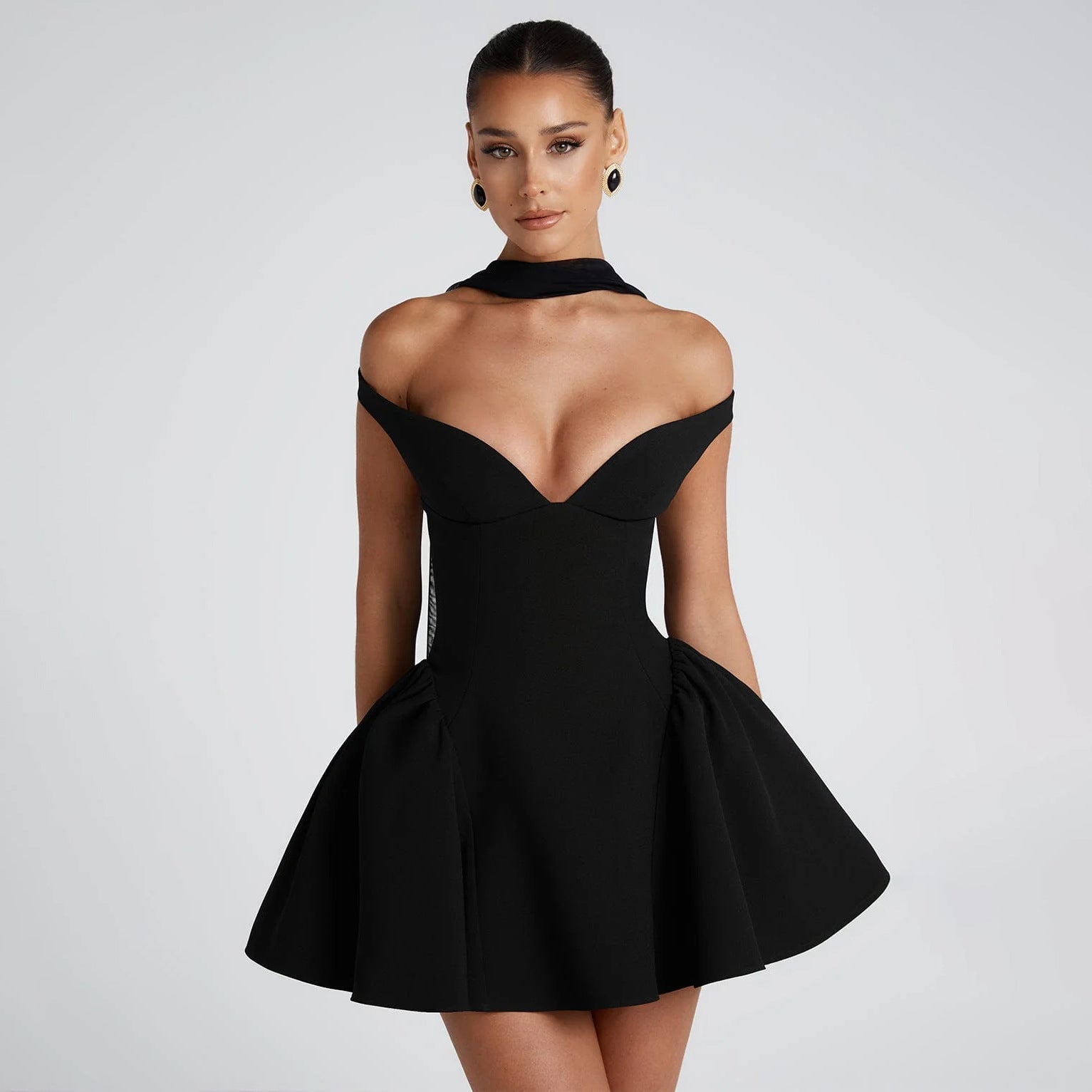 Women's black slim-fit off-shoulder cocktail dress with open-back elegant evening design
