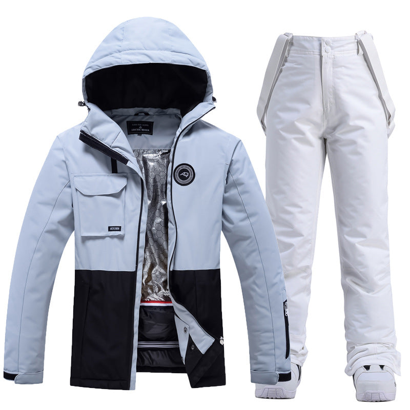 Women's two-piece ski suit in tailored fit, water-resistant windproof jacket and pants for winter slopes