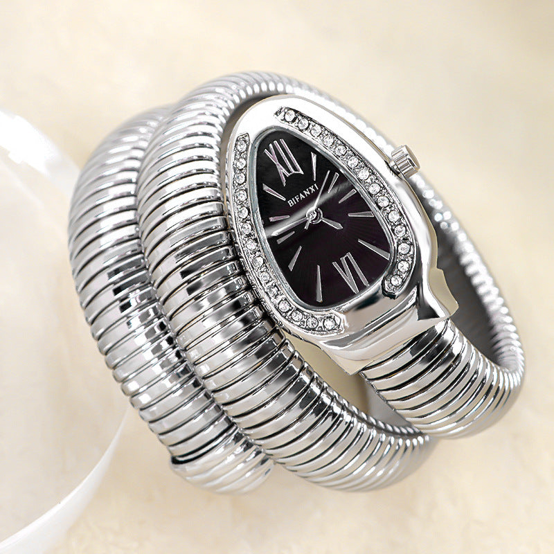 Women's snake-inspired quartz watch with custom bracelet, lightweight elegant gold-tone wrist accessory