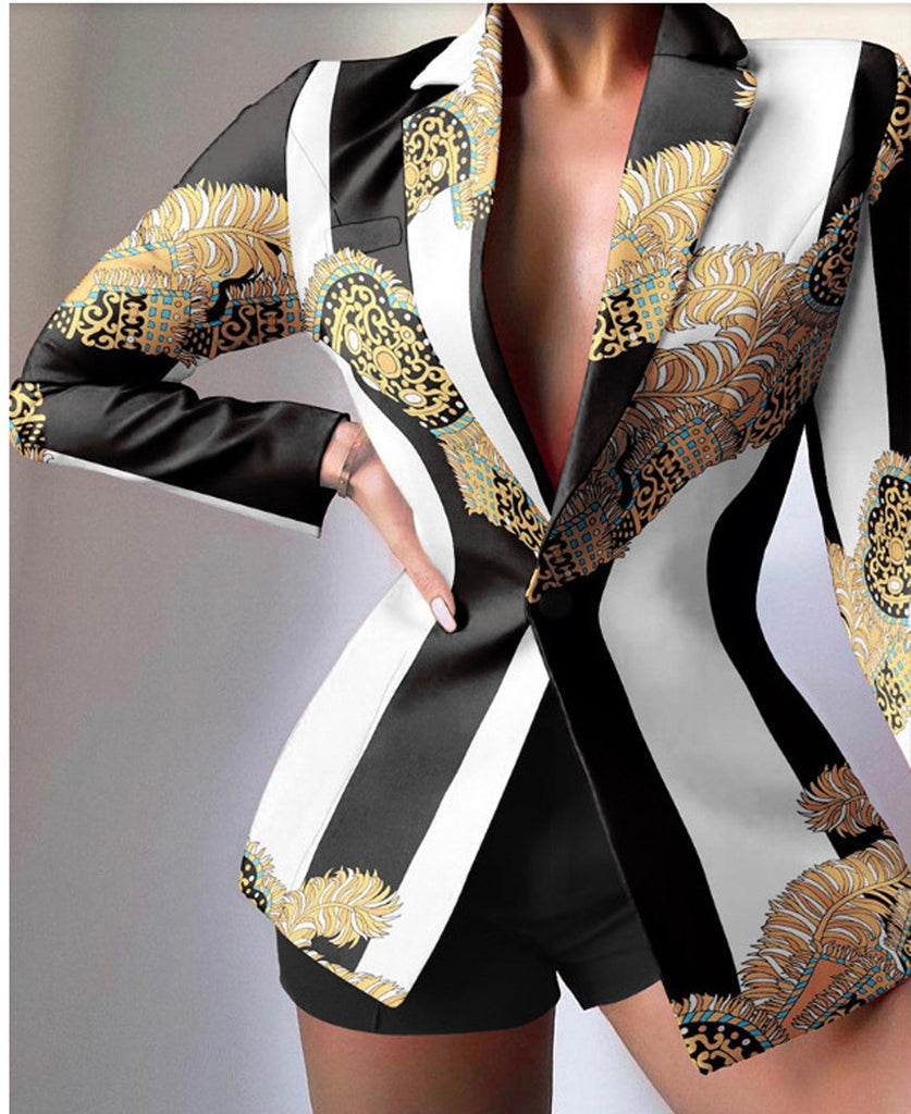 Women's leopard print tailored blazer with peaked lapels and long sleeves, bold statement piece