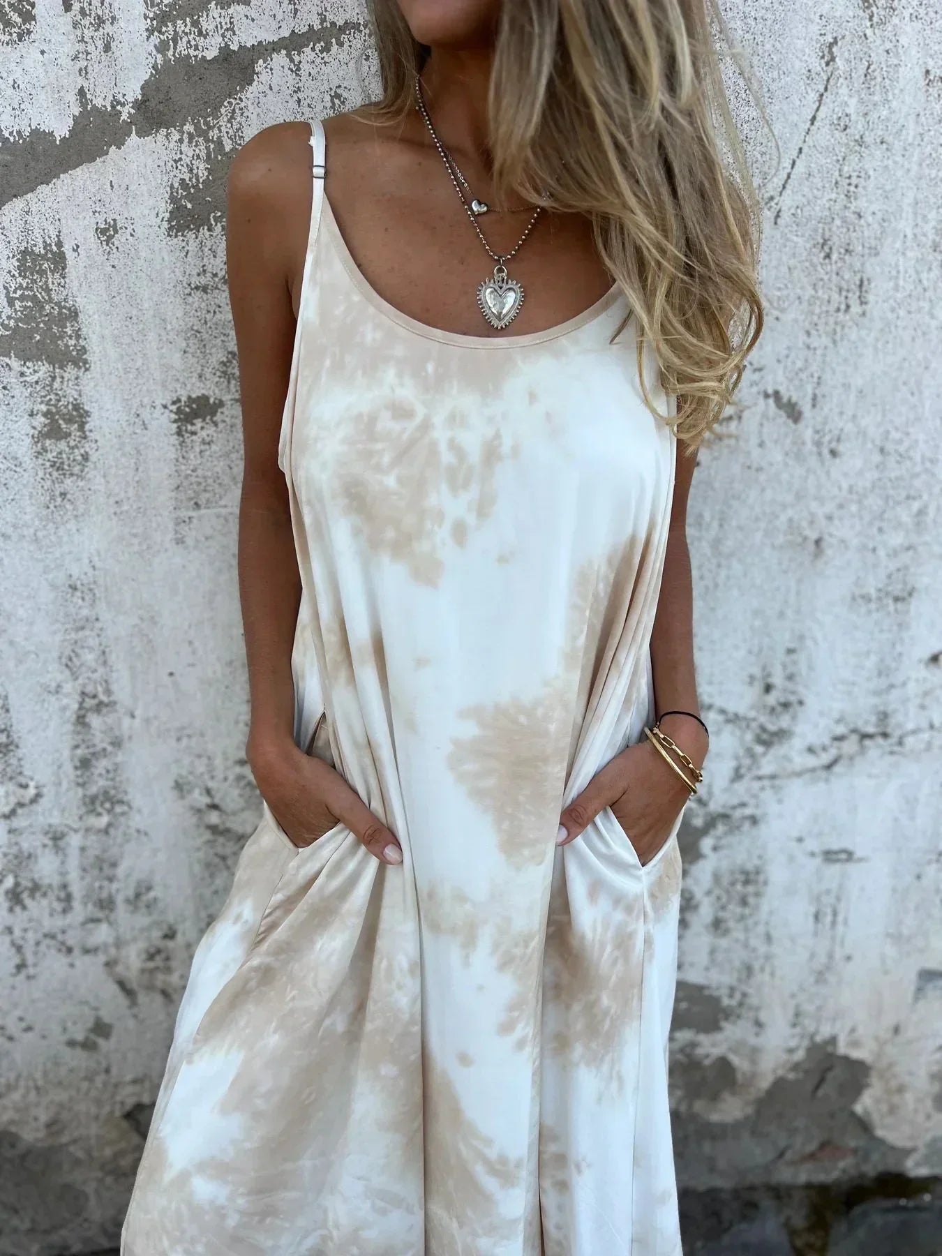 Women's flowy maxi dress with adjustable straps and side pockets, relaxed silhouette for everyday wear