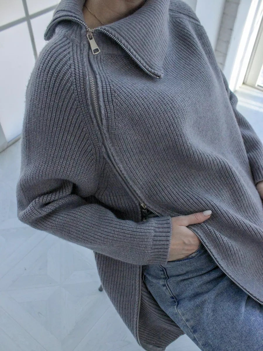 Women's oversized ribbed knit pullover sweater with asymmetrical zipper and large statement collar