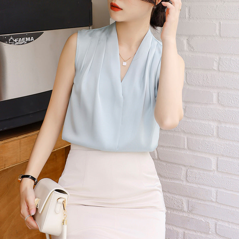 Women's ivory satin sleeveless blouse deep V-neck pleated wrap front flowy office-ready top