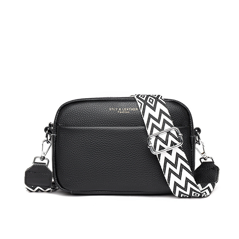 Stella pebbled leather crossbody bag structured silhouette with detachable wide strap for hands-free travel