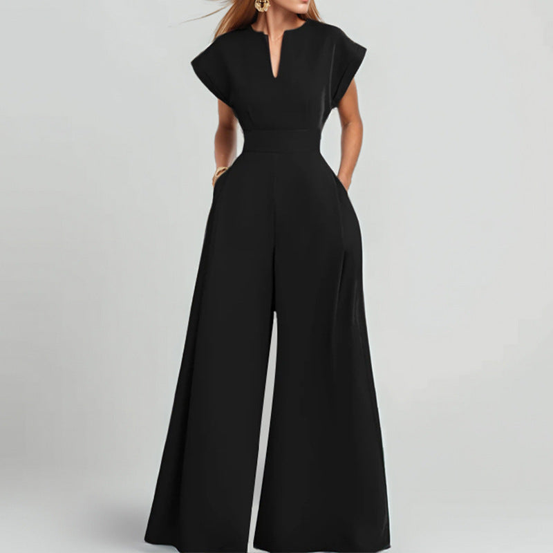 Women's loose fit wide leg jumpsuit with V-neck, short sleeves, and deep side pockets for versatile wear