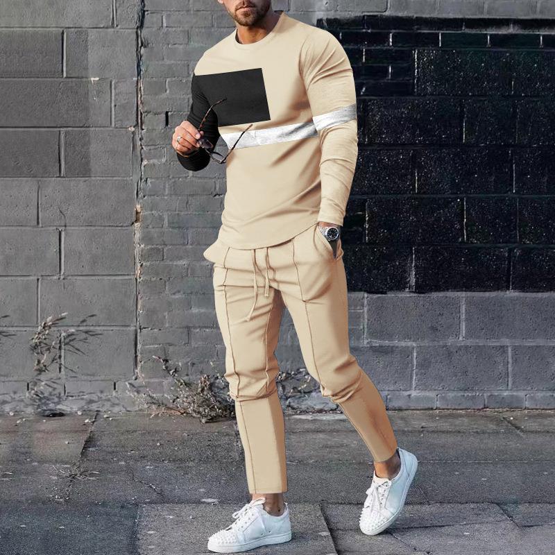 Men's slim fit two-piece tracksuit set with bold 3D print pullover and tapered stretch pants