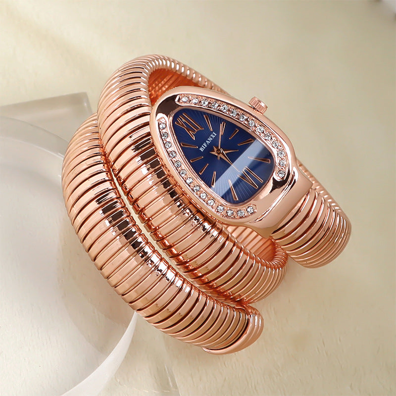 Women's snake-inspired quartz watch with custom bracelet, lightweight elegant gold-tone wrist accessory
