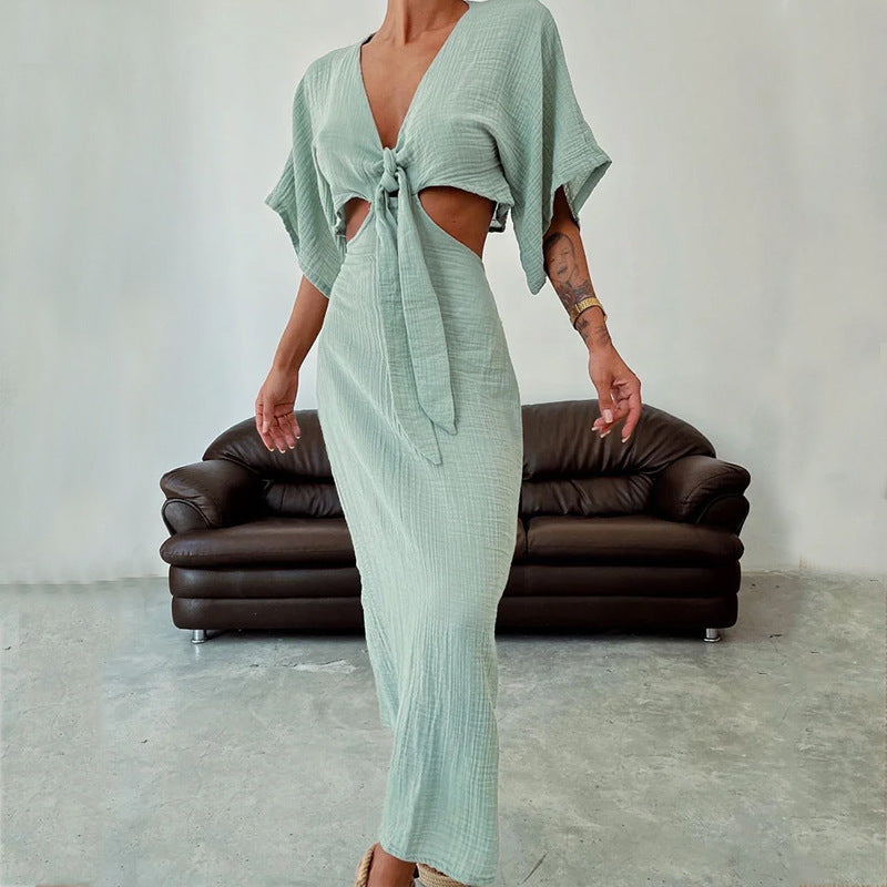 Slim fit maxi dress V-neck open back waist cutout chic flattering women silhouette