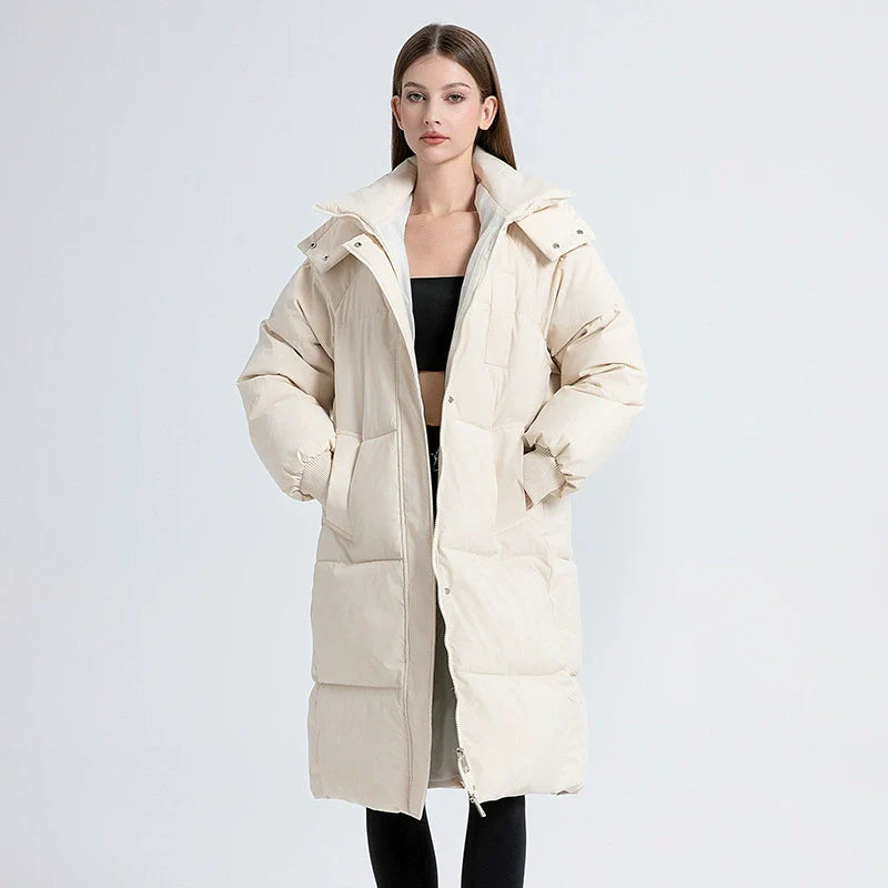 Women's longline oversized puffer coat quilted insulated with high collar hood for winter warmth