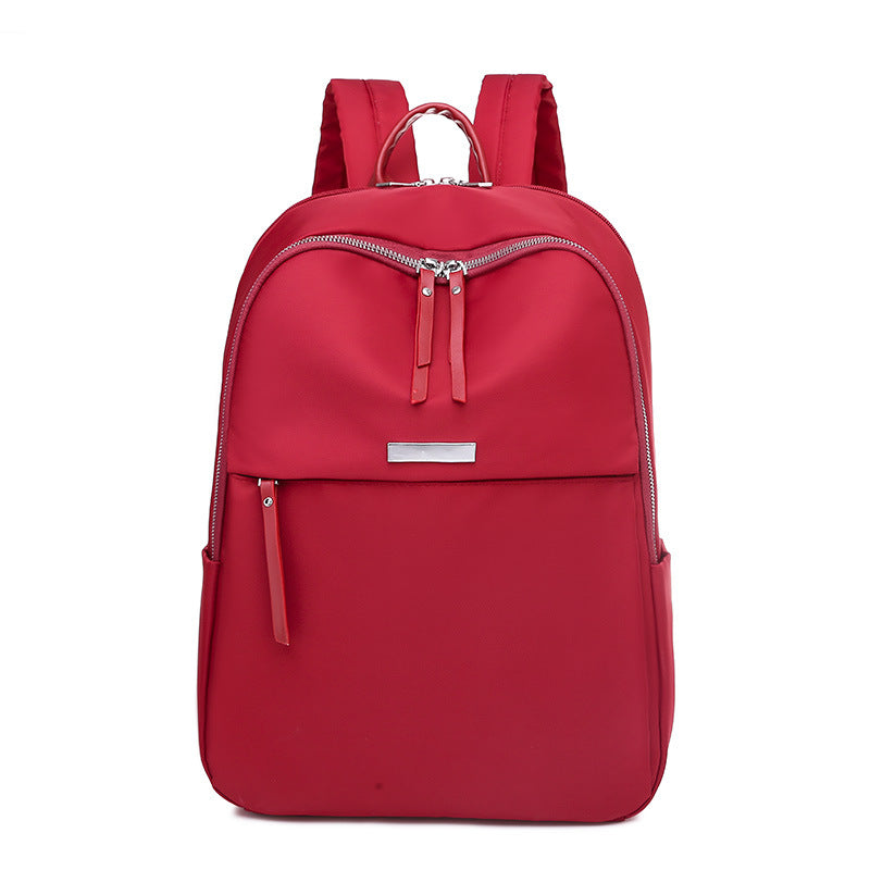 UrbanChic large-capacity Oxford fabric laptop backpack for business travel with elegant stitched band