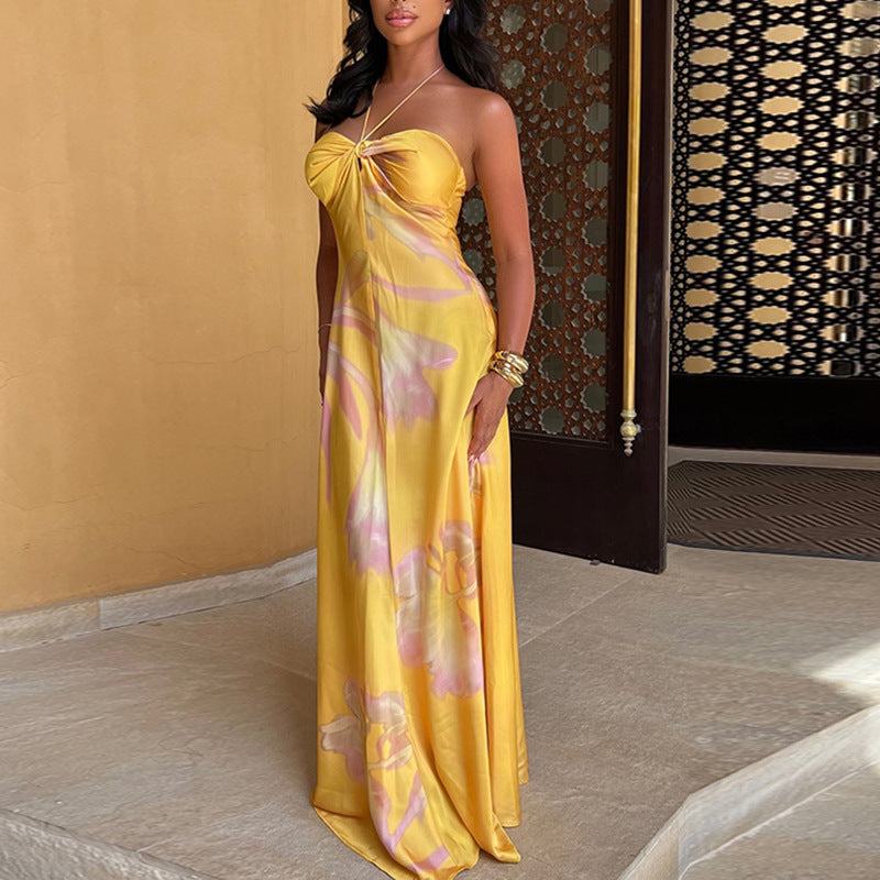 Floral satin-look maxi dress with halterneck bandeau neckline, elegant flowing silhouette for women