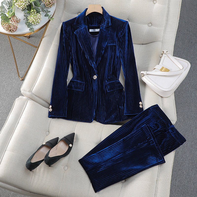 Women's burgundy velvet single-breasted tailored blazer suit with coordinated trousers for elegant formal wear