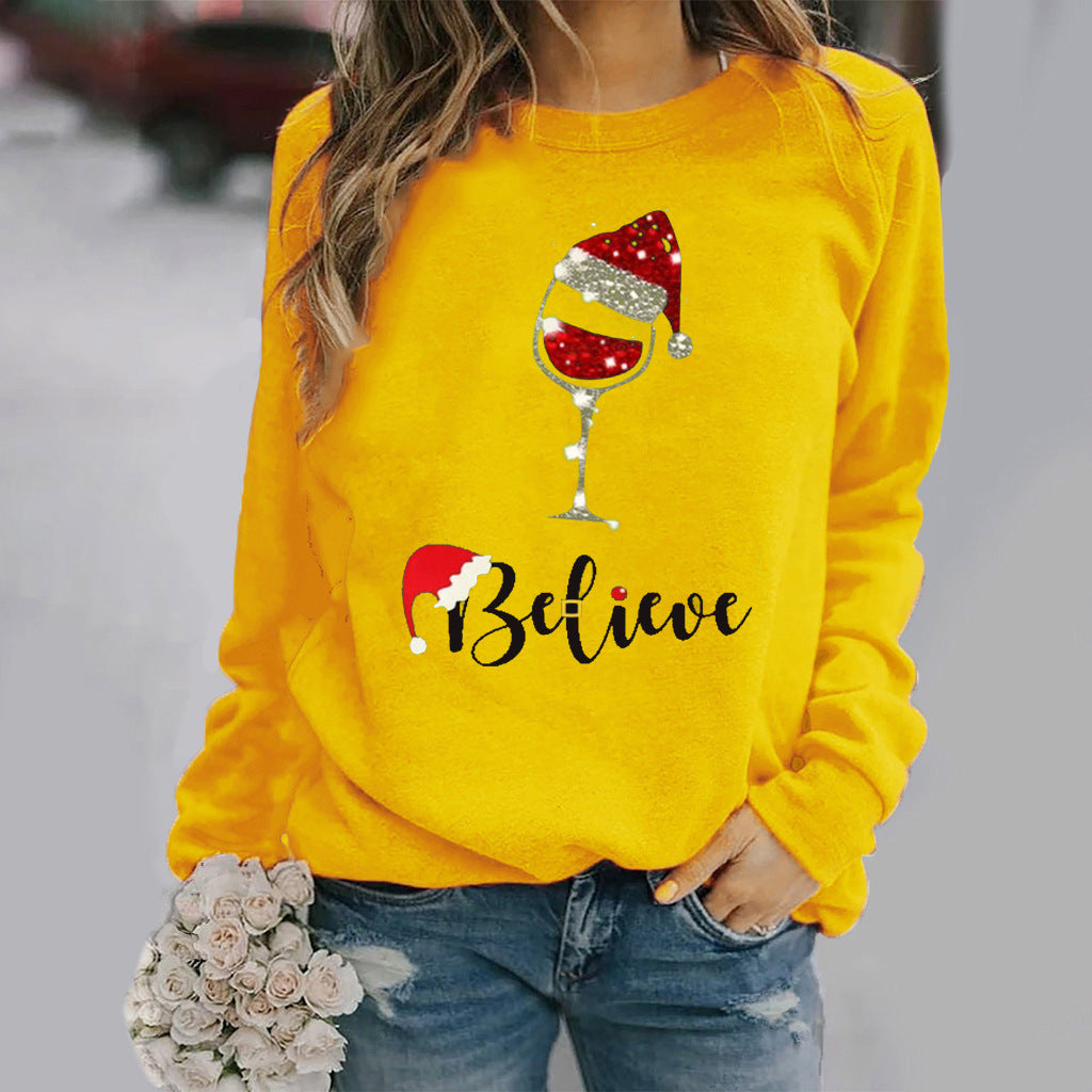 Women's relaxed fit cotton blend crew neck sweatshirt with festive holiday graphic print
