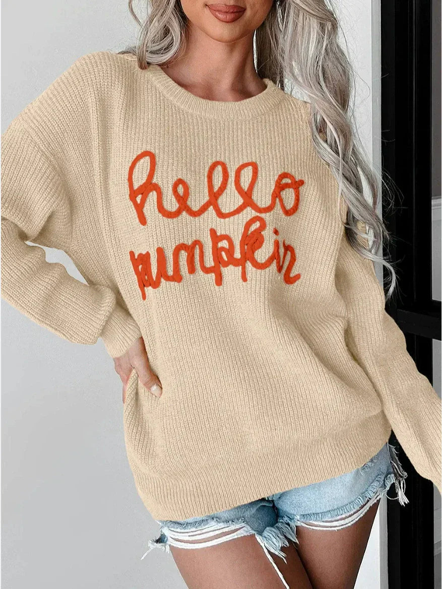 Women's wool blend relaxed fit sweater with ribbed texture and subtle letter detail