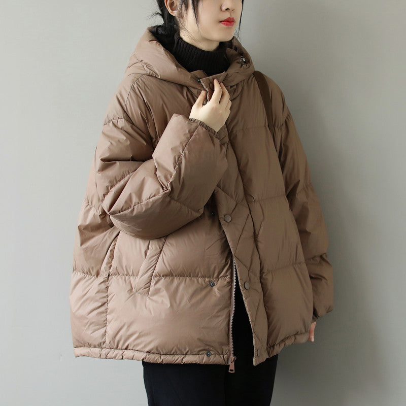 Women's hooded quilted puffer jacket in premium insulated winter outerwear with chic silhouette