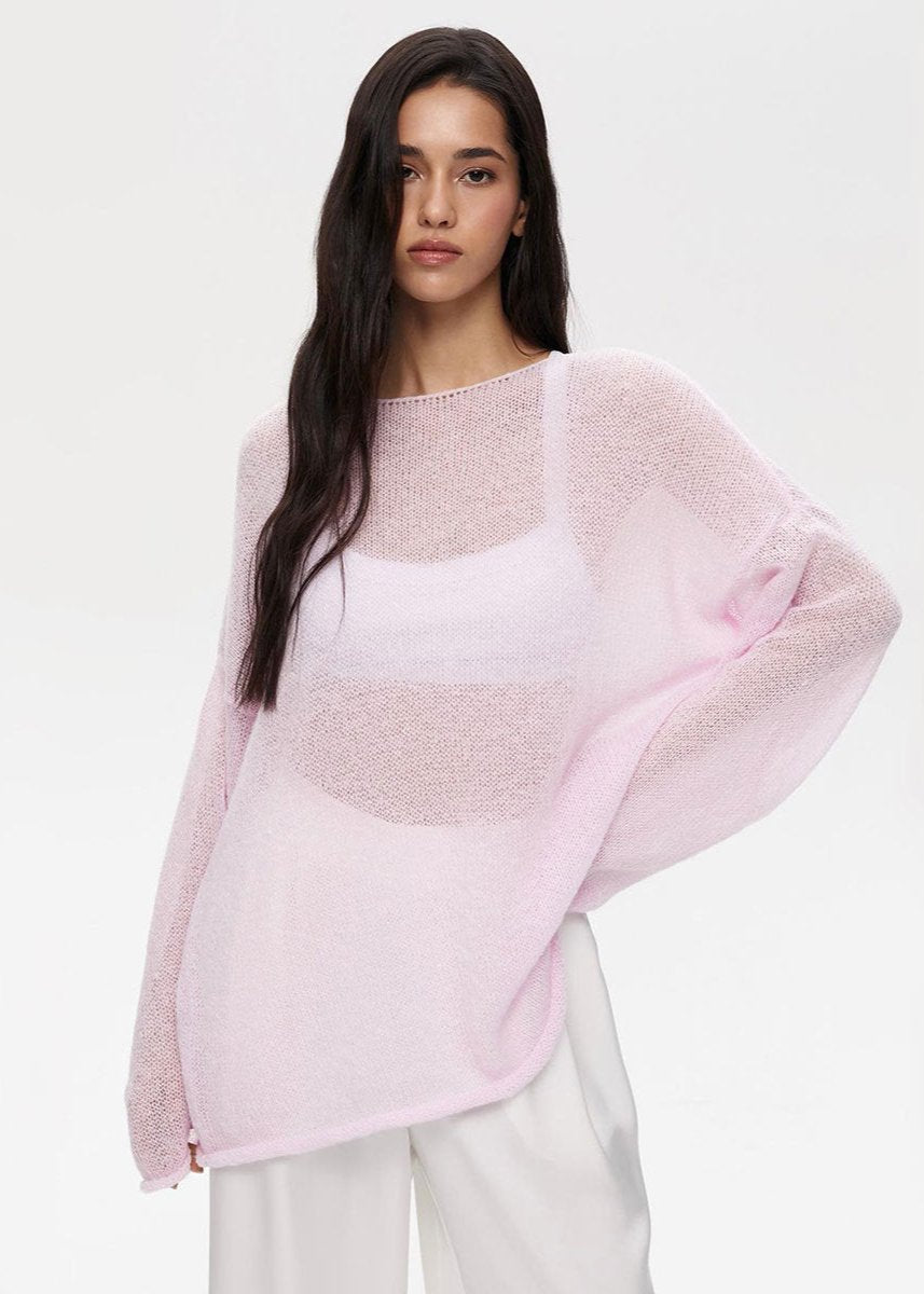 Pastel pink semi-sheer knit sweater women relaxed silhouette lightweight airy layering everyday style